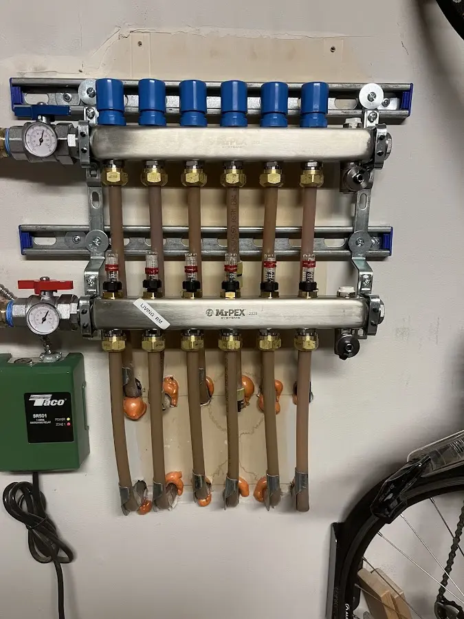 Plumber performing Gas Line Installation at a residential property in Mequon